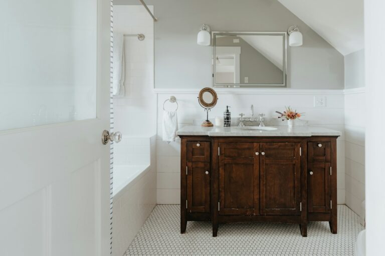 Bathroom vanity with a mirror and a clean countertop
